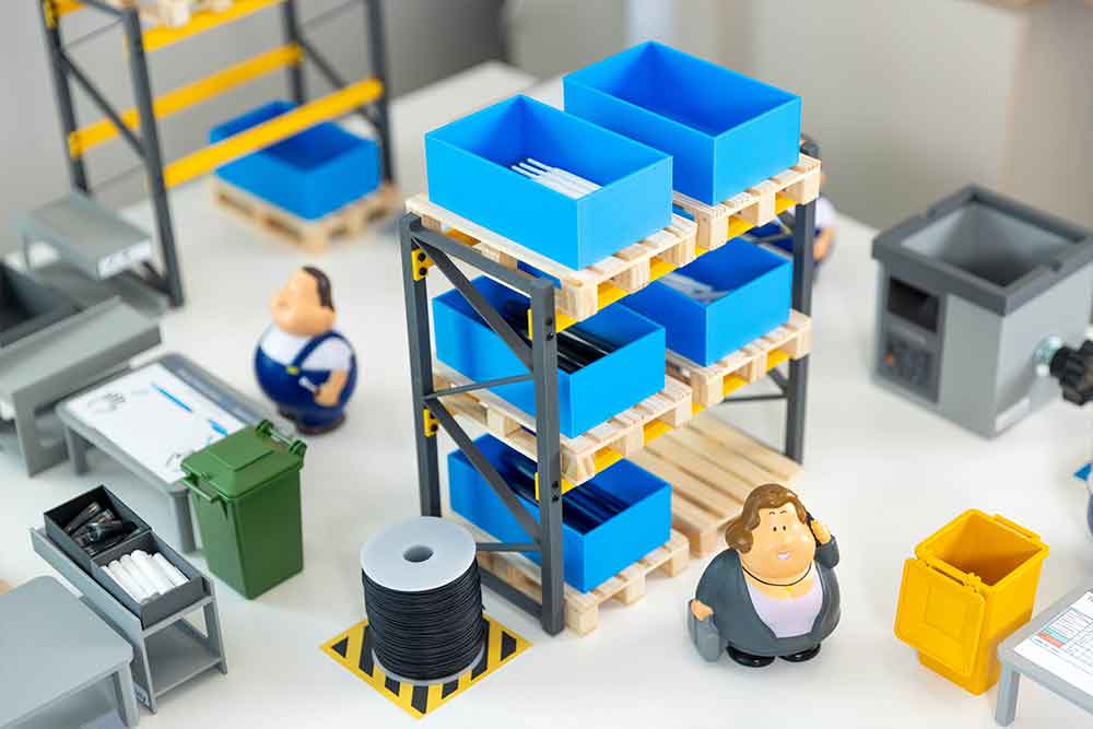 Participants working together during a Lean Game factory simulation