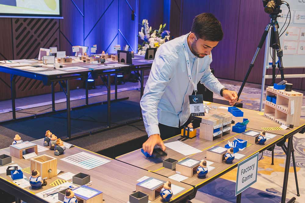 Participants working together during a Lean factory simulation